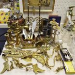 Metalware - a pair of brass candlesticks;