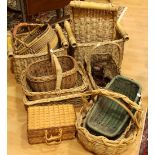 A collection of wicker and other baskets;A large wicker basket,