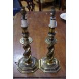 A pair of brass table lamps, spiral columns,