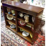 A mahogany floor standing bookcase 99H x 127W x 32.