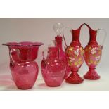 A cranberry glass pedestal bon-bon dish, a wine jug and stopper,