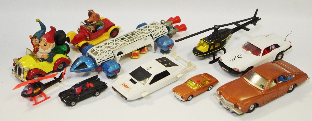 A Dinky no. 360 Eagle Freighter, blue and white; a Corgi 007 Lotus Esprit; others including no.
