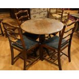 A George III oak tripod occasional table, circular tilting top, turned baluster column,