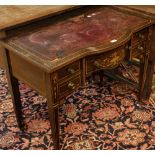 An Edwardian mahogany and marquetry writing table,