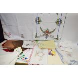Textiles - an embroidered table cloth, others similar, tray cloths,
