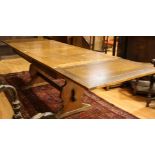 A large oak drawleaf dining table,