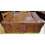 A substantial leather bound trunk,