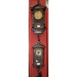 A mahogany regulator style wall clock, arched pediment, Roman numerals,