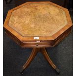 A reproduction octagonal occasional table, tooled leather inlay, drawers to frieze,