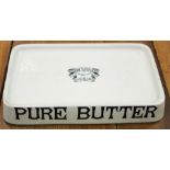 An early 20th century shop display Pure Butter ceramic stand, Reuben Sutcliffe, Manchester,