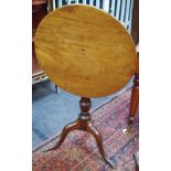 A George III mahogany one piece tripod occasional table, tilt top movement, c.