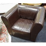 A modern leatherette deep armchair