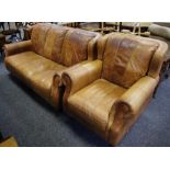 A contemporary brown leather 3-seat sofa and conforming armchair