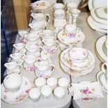 A quantity of Royal Crown Derby Posies pattern table ware, including cups and saucers, side plates,