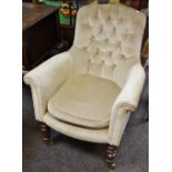 A Victorian button back armchair, upholstered in mushroom velour, c.