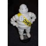 A reproduction cast metal figure, Bibendum Michelin Man,