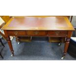 A Victorian mahogany writing desk, leather inlaid top, three drawers to frieze,