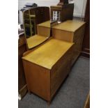 A mid-20th century retro light oak dressing table and chest of drawers, by Harris Lebus,