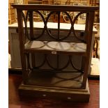 A mahogany two tier bookcase with X-frame sides.