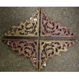 Four reproduction cast metal wall/shelf brackets