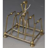 A silver plated toast rack in the manner of Christopher Dresser, by Hukin and Heath,