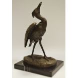 A dark patinated bronze, Heron, after A.