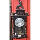 A regulator wall clock, purchased in Sumatra,