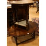 An early 20th century oak credence type table, hinged moulded top opening for convenience,