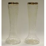 A pair of George V silver mounted cut glass mantel vases,