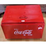 A contemporary drinks holder, in the manner of Coca Cola,