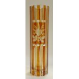 A large Bohemian glass vase, alternating bands of amber and clear glass,