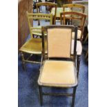 A harlequin set of Edwardian mahogany salon chairs; a mahogany nest of three tables,