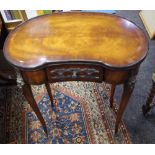 A Louis XV design metal mounted kidney shaped side table, drawer to frieze, slender serpentine legs,