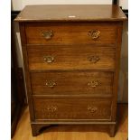 An early-mid 20th century oak chest of four long drawers, bracket feet,