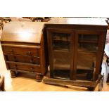A late 19th century oak pier display cabinet,
