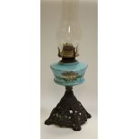 A Victorian blue milk glass and enamelled oil lamp