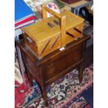 A sewing box on stand; another smaller folding; assorted dress and clothing patterns;