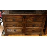 An early 18th century oak Lancashire type mule chest, hinged top above four blind drawers,