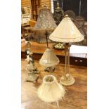 A contemporary gilt metal table lamp, leaded glass conical shade; another similar,