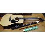 A Falcon acoustic six string guitar,