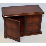 A miniature mahogany cupboard
