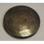 A George VI silver circular compact, of substantial gauge,