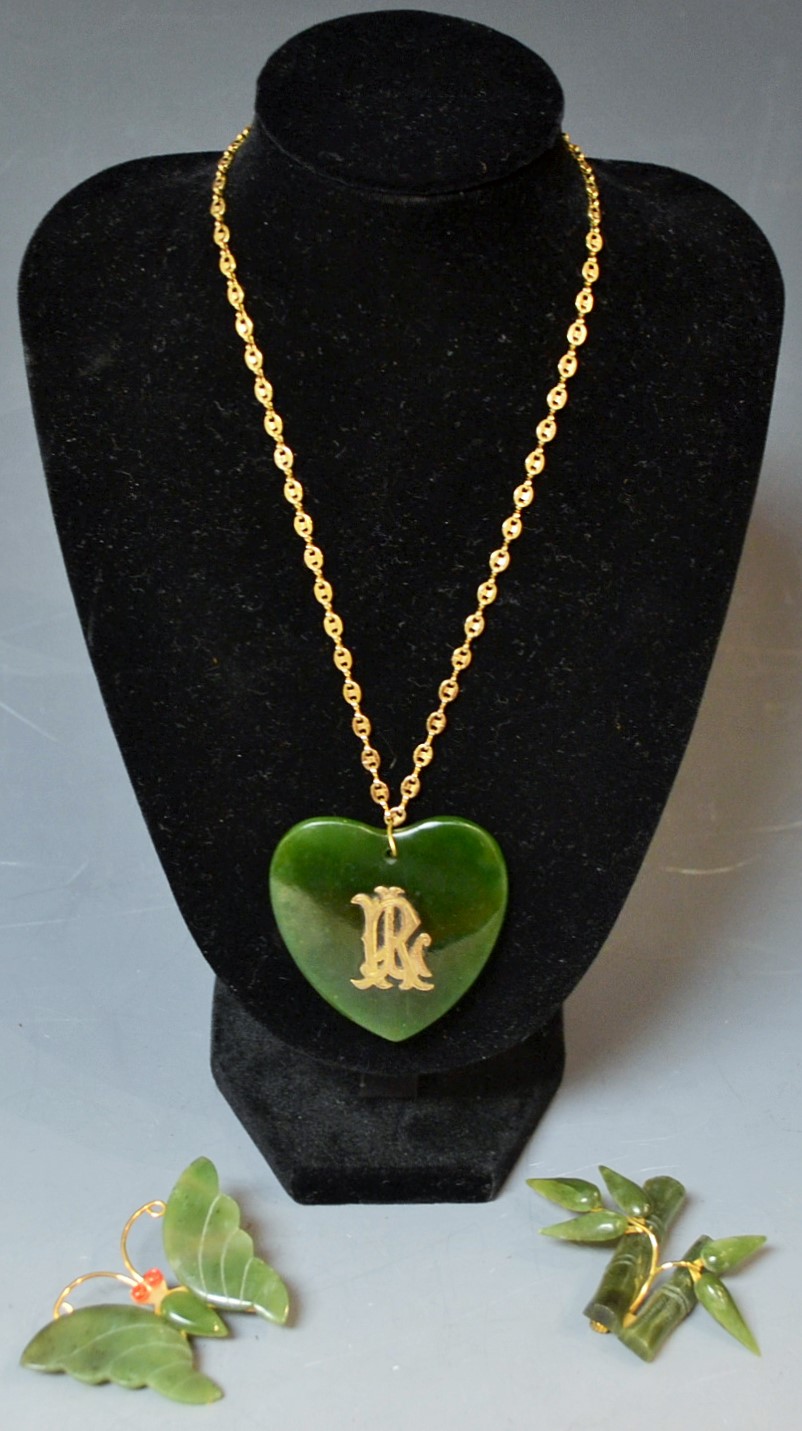 Jewellery - a green stone, possibly jade, heart pendant, with applied RL initials,