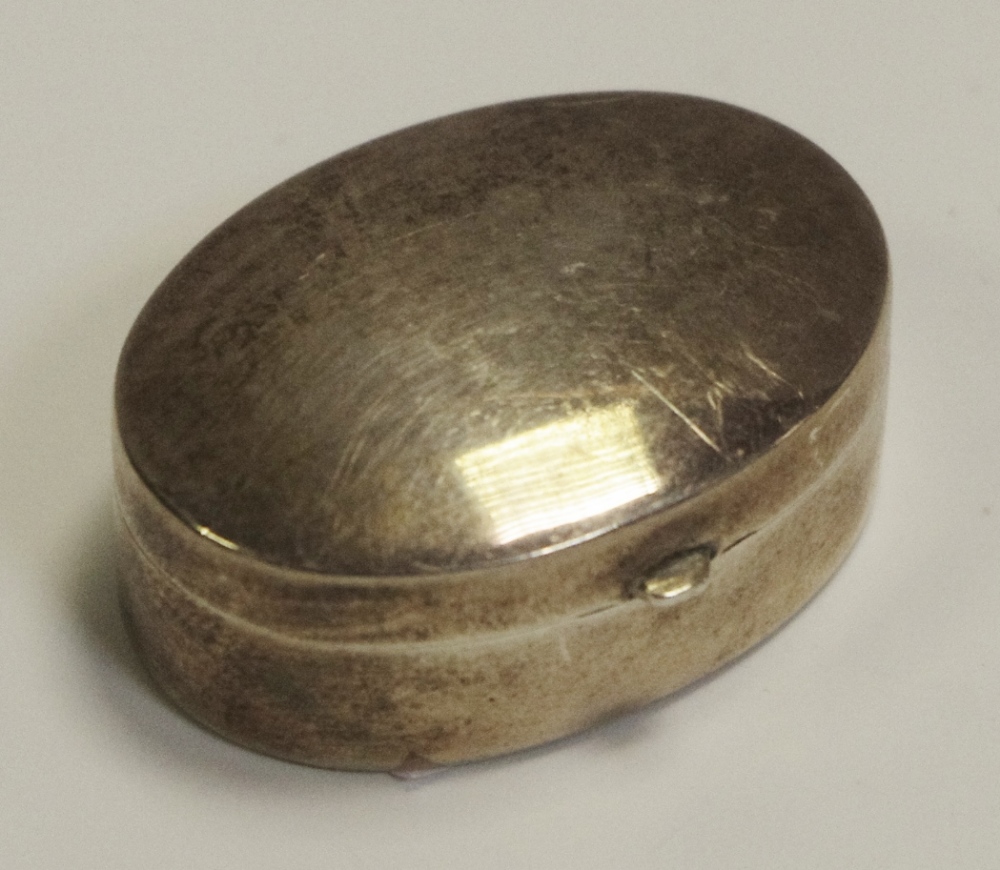 A sterling silver pill box or bonbonniere