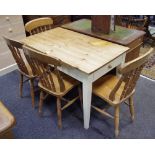 A contemporary painted pine kitchen table with four dining chairs (5)