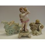 A Naples porcelain figure of a cherub, with conch shell; a bisque basket; another with putto, c.