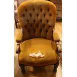 A Victorian mahogany framed open armchair, deep button back, scroll handrests,