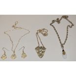 A silver Celtic pendant necklace; a silver Charles Rennie Mackintosh drop pendant,