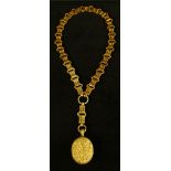 A Victorian gilt metal locket pendant necklace, the oval locket intricately cased with shells,