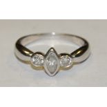 A modernist design diamond trilogy ring, central marquise cut diamond approx 0.